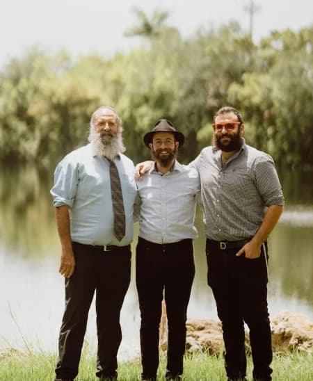 Rabbi Pinny Andrusier, Rabbi Aizik Chanin, and Rabbi Zalmy Raksin